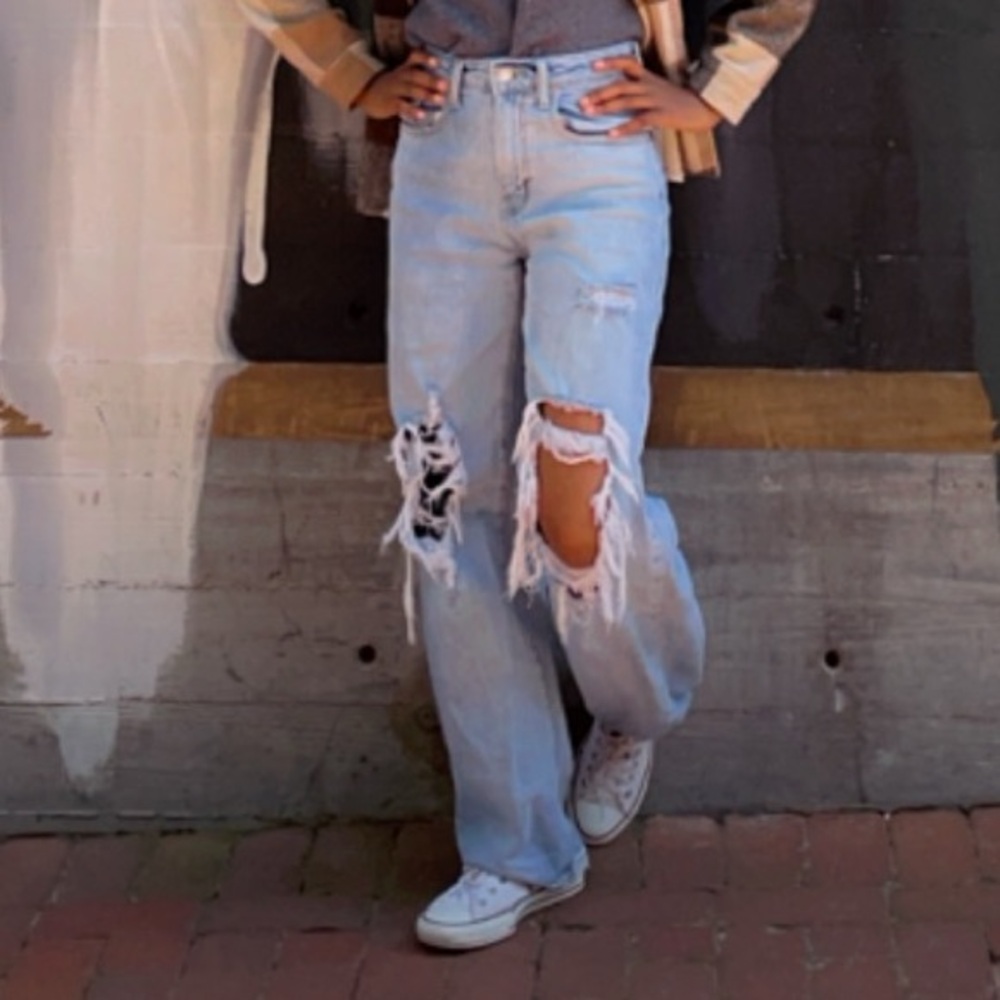 Ripped jeans, light colored